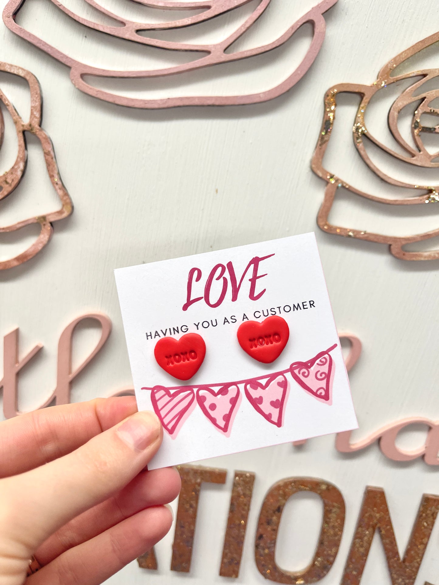 Red xoxo heart studs